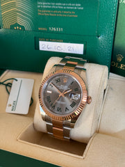 Pre-owned Rolex Datejust 126331 Wimbledon Dial Rose Gold Steel Oyster Strap Fluted Bezel 2021 Box and Papers