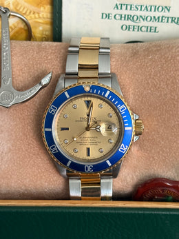 Pre-owned Rolex Submariner 16613 Bluesy Serti Dial 1994 Box and Papers Mint Condition