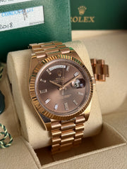 Pre-owned Rolex DayDate 40 228235 Chocolate Baguette Diamond Dial