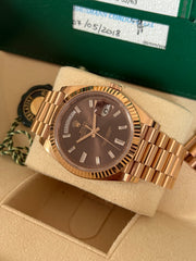 Pre-owned Rolex DayDate 40 228235 Chocolate Baguette Diamond Dial
