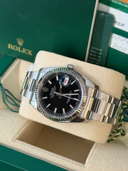 Pre-owned Rolex Datejust 36mm 116234 2017 Black Dial Oyster Strap Fluted Bezel Box and Papers Complete Set with Rolex Service Card