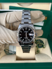 Pre-owned Rolex Datejust 36mm 116234 2017 Black Dial Oyster Strap Fluted Bezel Box and Papers Complete Set with Rolex Service Card