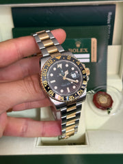 Pre-owned Rolex GMT Master II 40mm 116713LN Steel and Gold 2010 Complete UK Set
