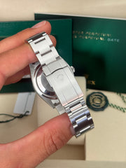 Pre-owned Rolex Oyster Perpetual Green 126000 2025 New Condition Complete Set UK Watch