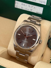 Pre-owned Rolex Oyster Perpetual 39mm Grey Dial 114300 2018 Box and Papers