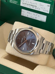 Pre-owned Rolex Oyster Perpetual 39mm Grey Dial 114300 2018 Box and Papers